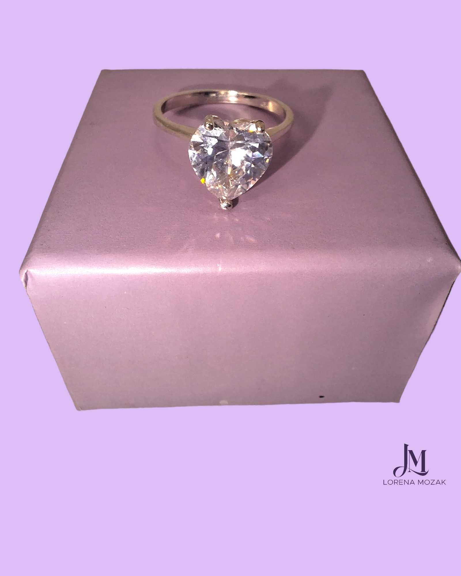 ANILLO FORMA DE  CORAZÓN PLATA FINA 925  HECHO EN MÉXICO BY LORENA MOZAK  ANILLO DE PLATA FINA CON ZIRCONIAS EN FORMA DE MOÑO COQUETE